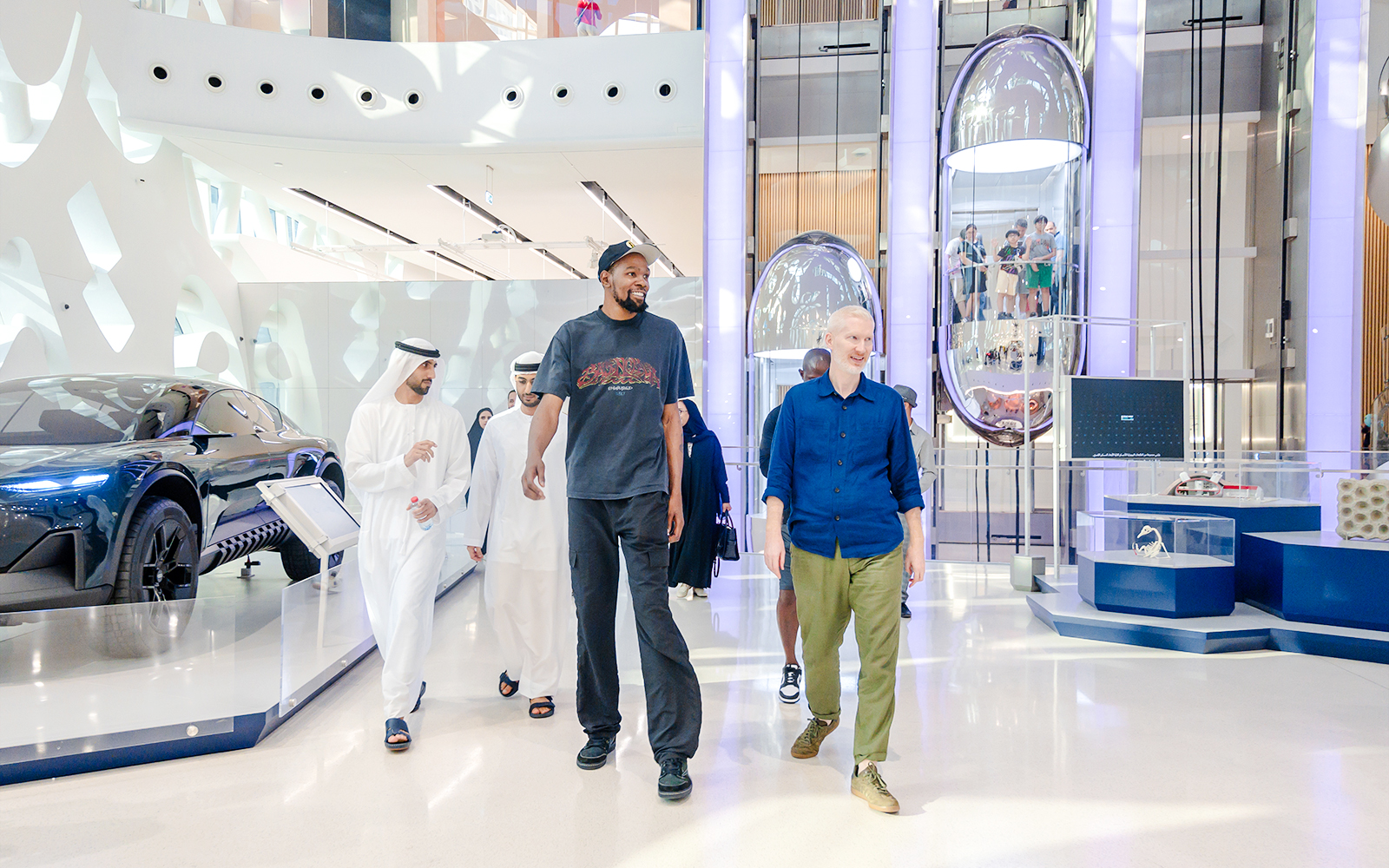 Visitors exploring the futuristic exhibits at the Museum of the Future in Dubai.