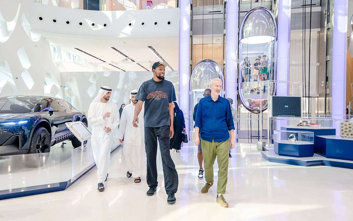 Visitors exploring the futuristic exhibits at the Museum of the Future in Dubai.