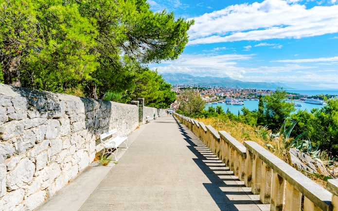 Pathway on Marjan Hill overlooking Split, Croatia with city and sea views.
