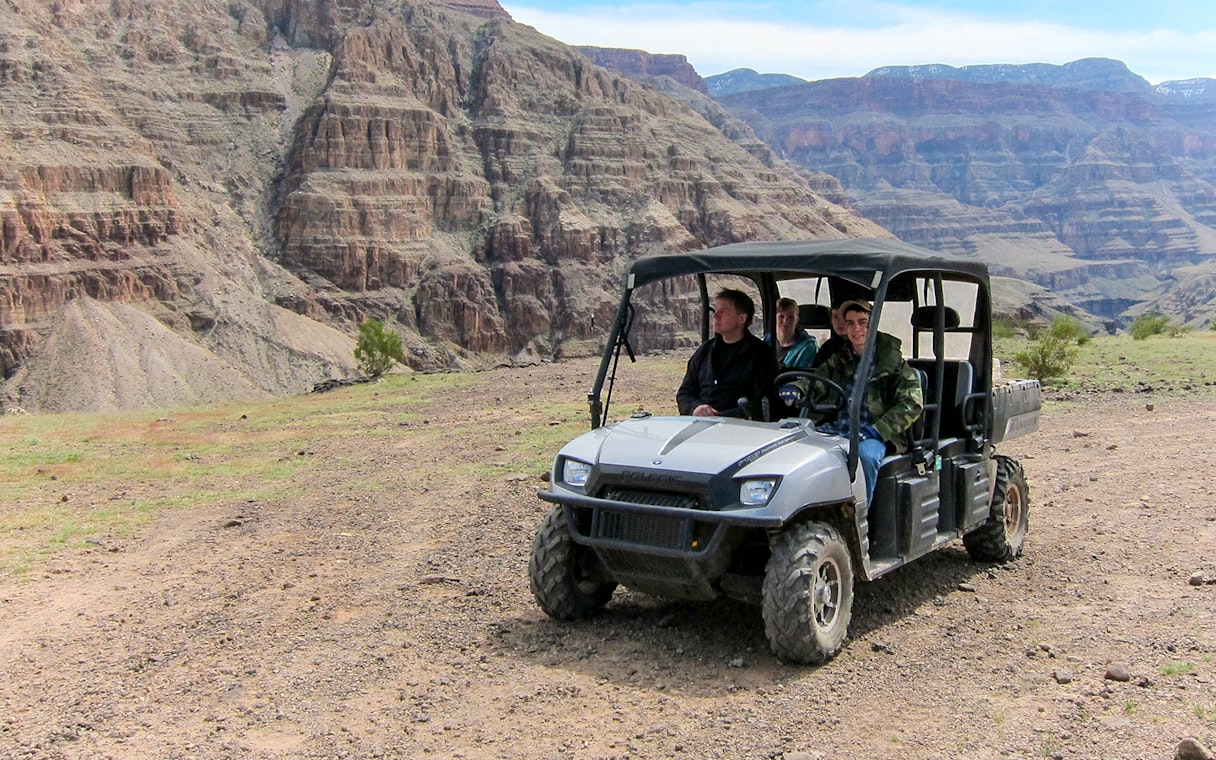Jeep driving through rocky terrain on a self-drive excursion.