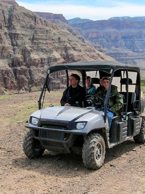 Jeep driving through rocky terrain on a self-drive excursion.