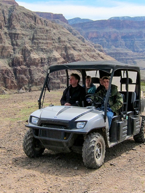 Jeep driving through rocky terrain on a self-drive excursion.