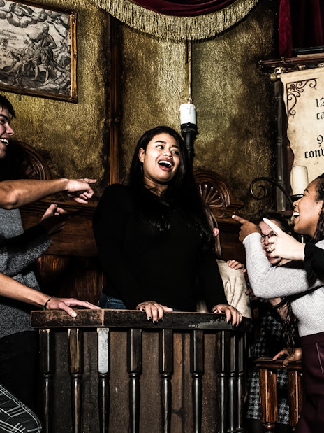Participants in a mock trial at The Council of Blood play, Amsterdam Dungeon.
