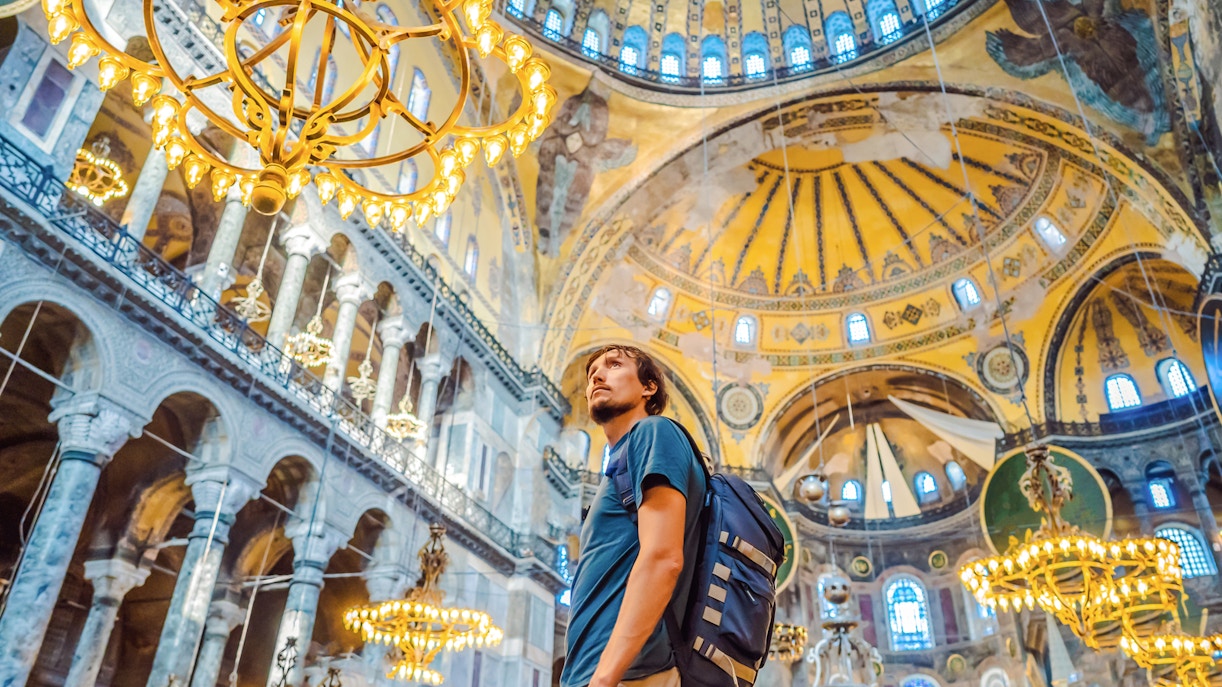 Tourist admiring the interior of Hagia Sophia, Istanbul.