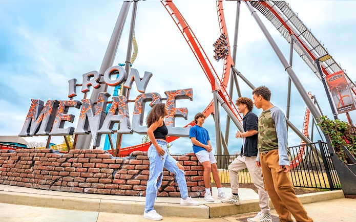 Visitors at Iron Menace roller coaster entrance, Dorney Park, Six Flags.