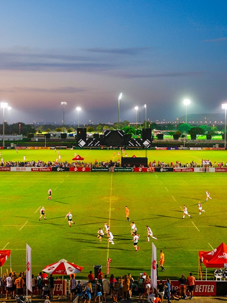 Rugby match at Emirates Dubai 7s stadium during evening, Dubai, UAE.