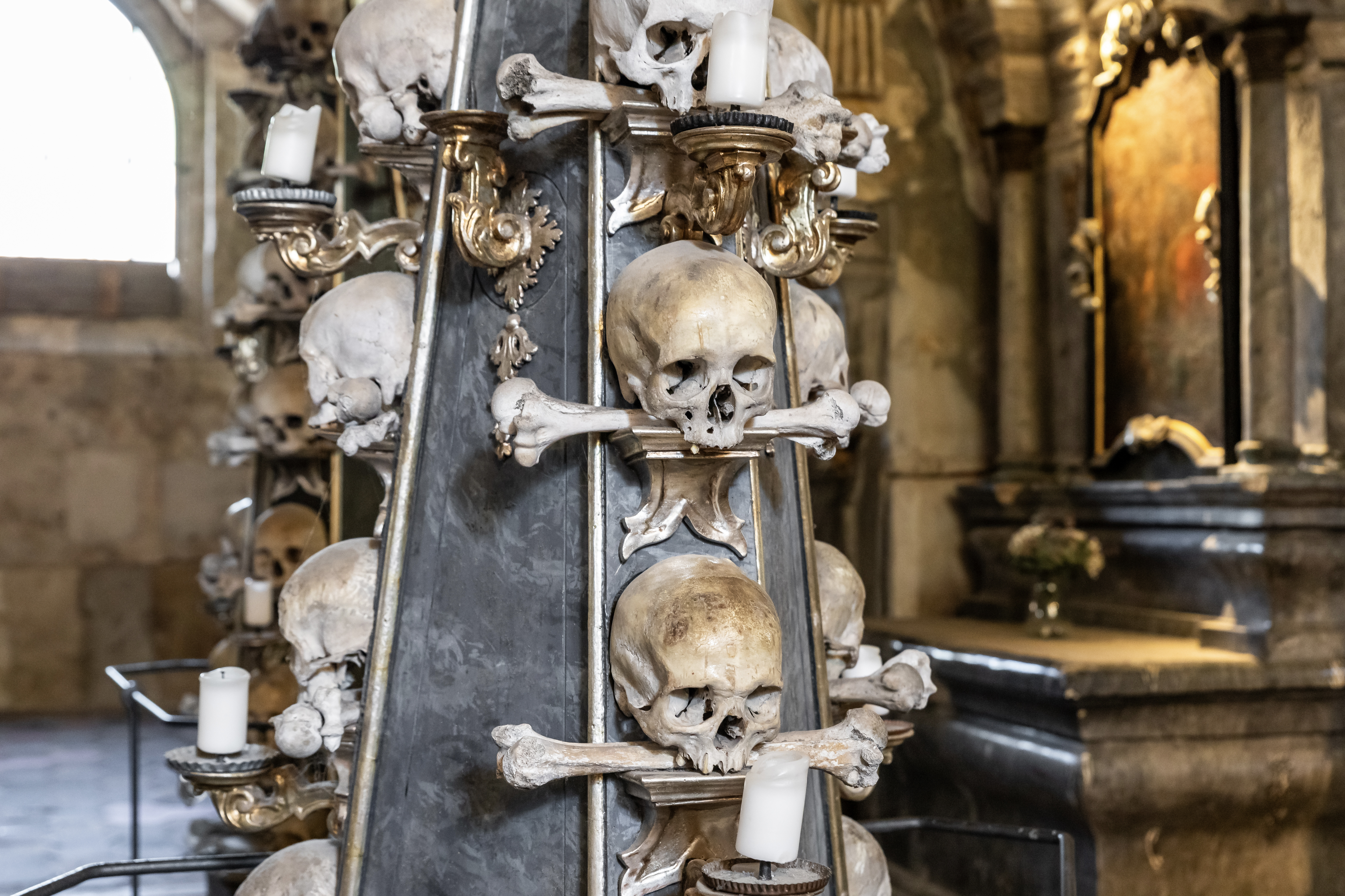 Candlestick made of human bones and skulls in Sedlec Ossuary, Kutna Hora.