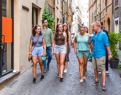 Group walking through Rome's Jewish Ghetto on a guided tour.