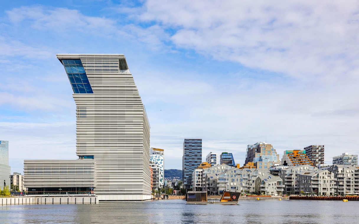 Oslo's Munch Museum and waterfront buildings viewed from the fjord.