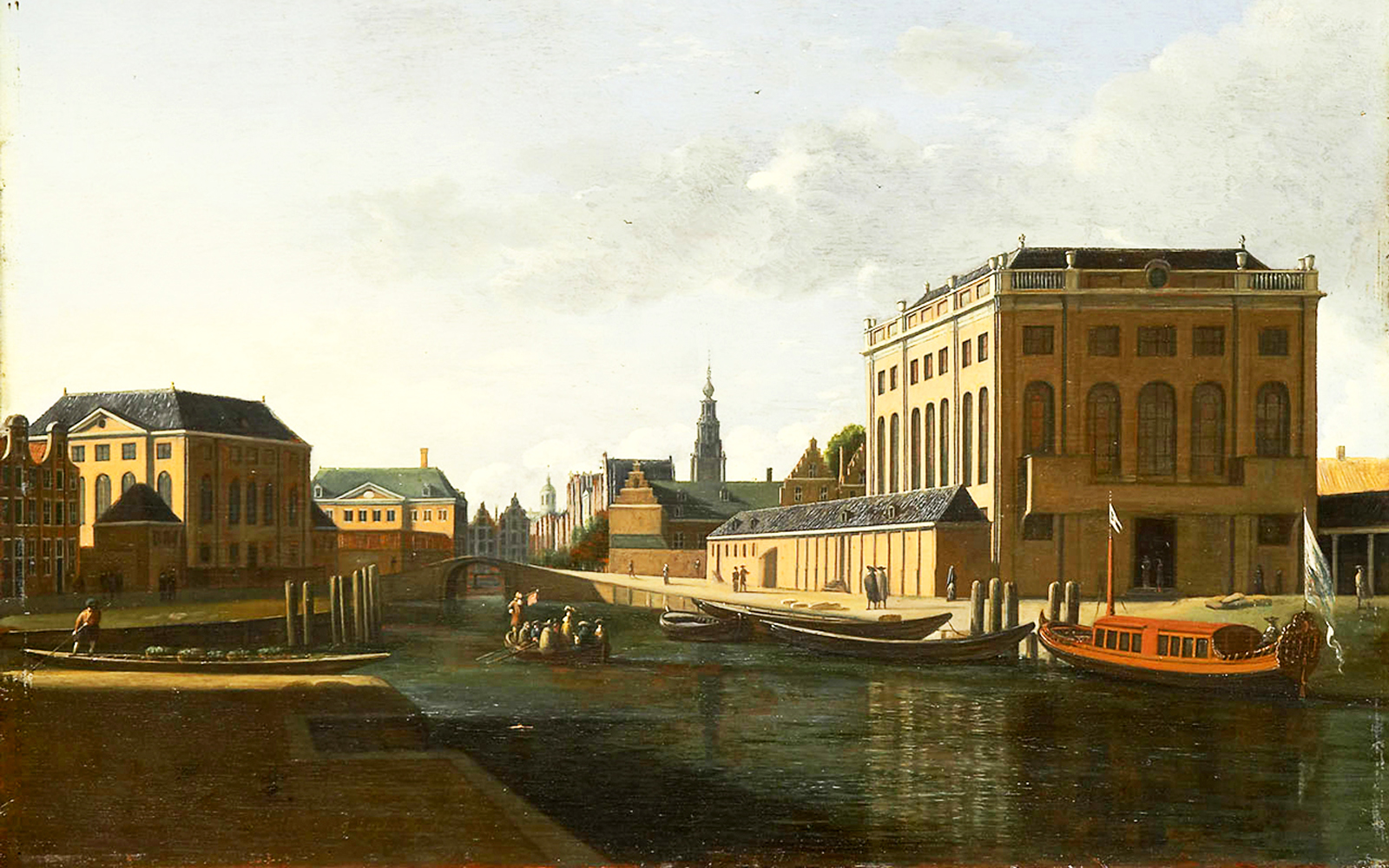 Canal view with historic buildings and boats in Amsterdam, part of Small-Group Jewish History Tour.