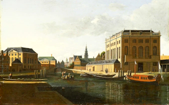 Canal view with historic buildings and boats in Amsterdam, part of Small-Group Jewish History Tour.