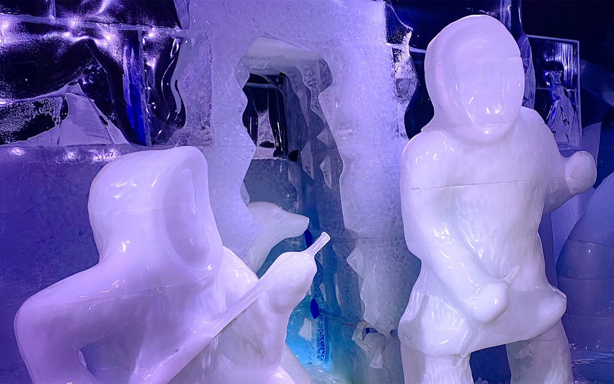 Ice sculptures of figures and animals at Berlin Icebar.
