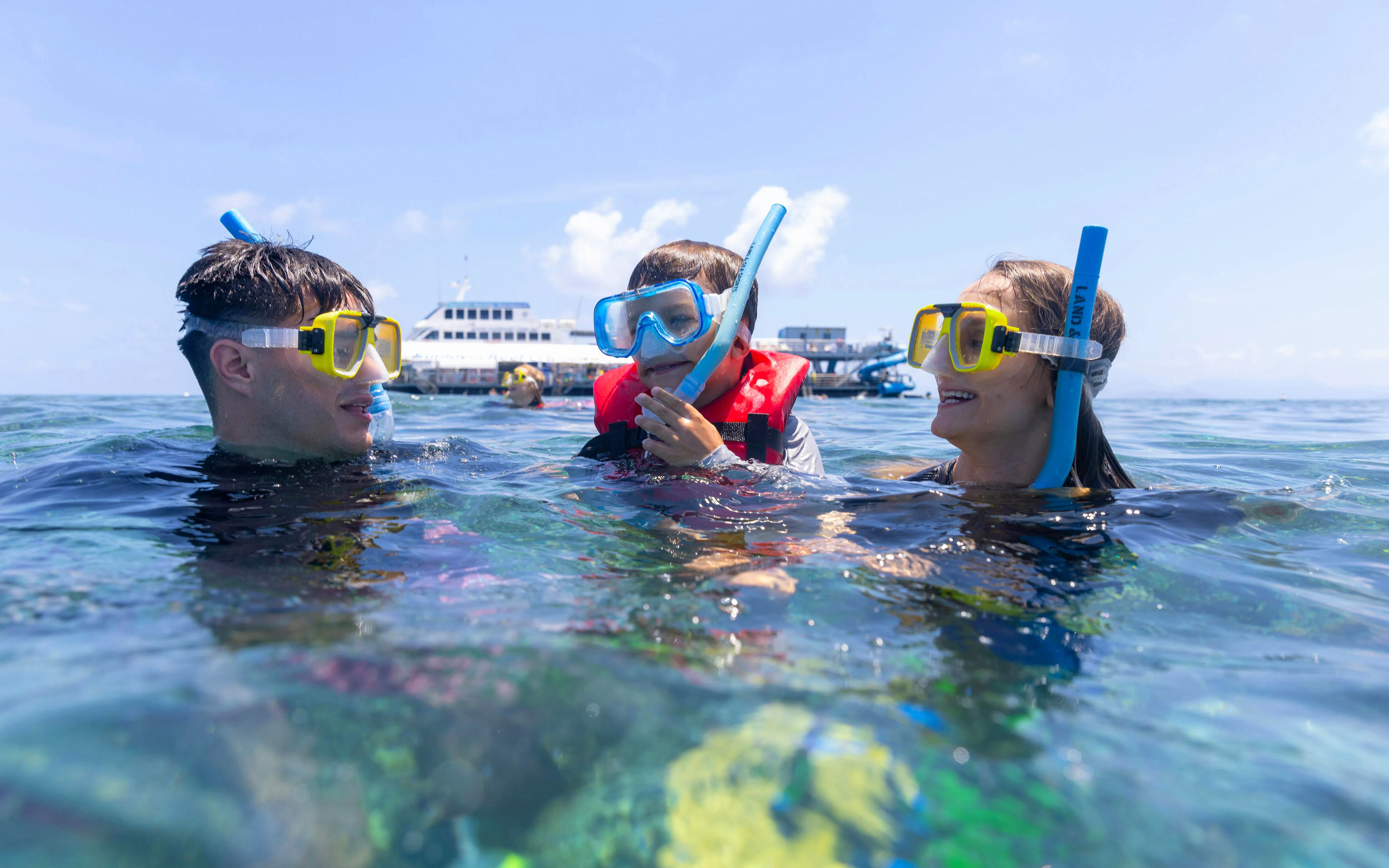 Snorkelers enjoying Sunlover Reef Cruises at Great Barrier Reef.