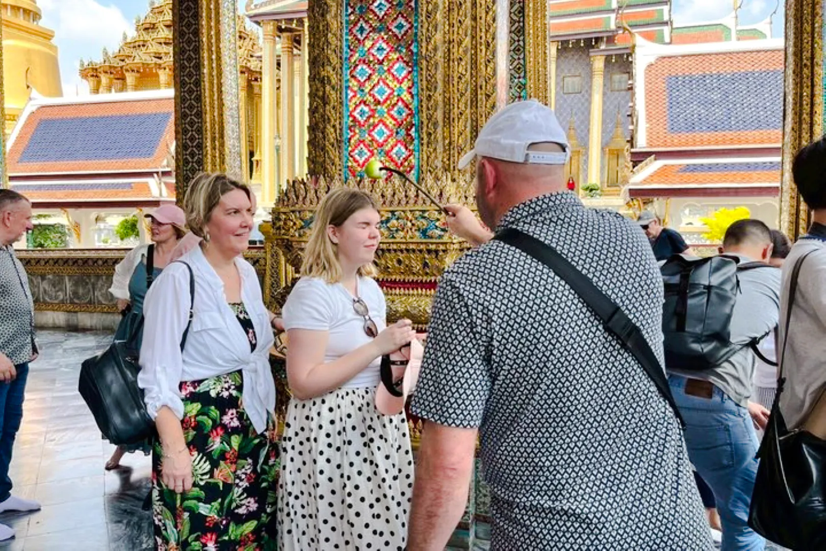 Tourists exploring ornate architecture at Wat Pho during a private tour from Laem Chabang, Pattaya.