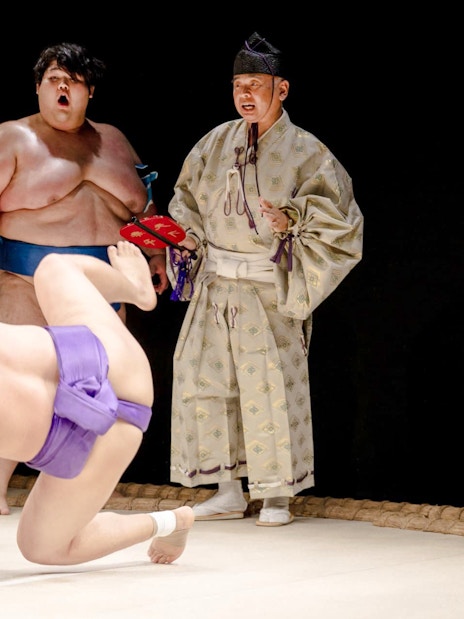 Sumo wrestlers practicing at Sumo Hall Hirakuzu during training experience.