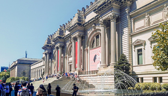 Visitors exploring exhibits at the Metropolitan Museum of Art, New York City.
