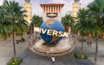 Universal Studios Singapore entrance with globe sculpture, part of Go City Singapore Pass.