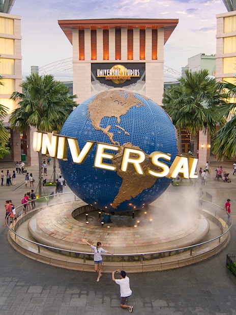 Universal Studios Singapore entrance with globe sculpture, part of Go City Singapore Pass.