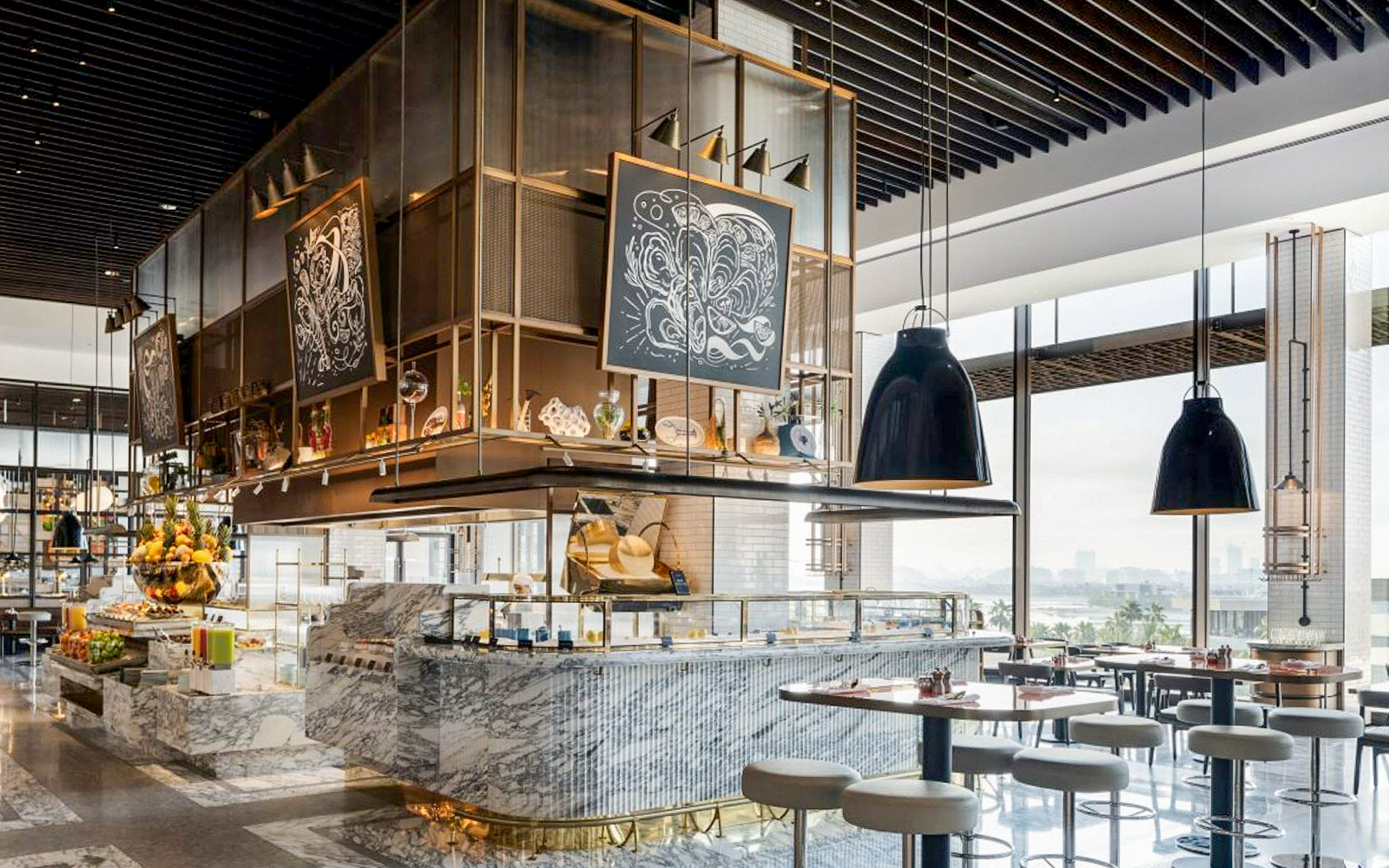 Dining area at Gastronomy, Dubai with marble counters and modern decor.