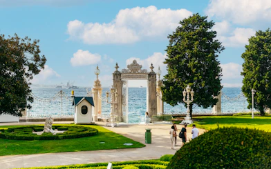 Waterfront gate of Dolmabahçe Palace overlooking the Bosphorus in Istanbul, Turkey.