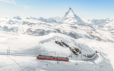 Train traveling from Zermatt to Mount Gornergrat with Matterhorn in the background.