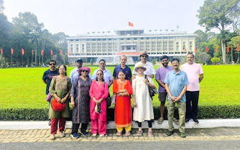 Group of tourists in front of Independence Palace, Ho Chi Minh City.
