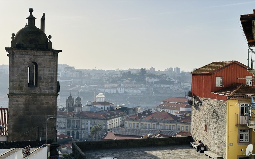 View from Porto Cathedral overlooking city rooftops and distant hills.