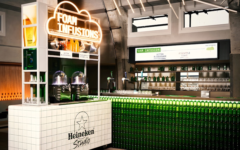 Heineken Experience bar with foam infusions display in Amsterdam.
