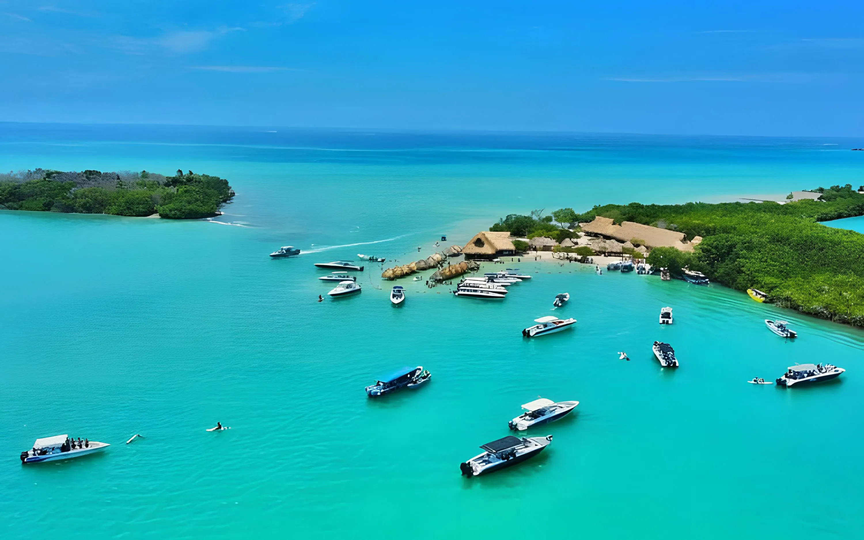 Boats on clear blue water near Rosario Islands, Cartagena, Colombia.