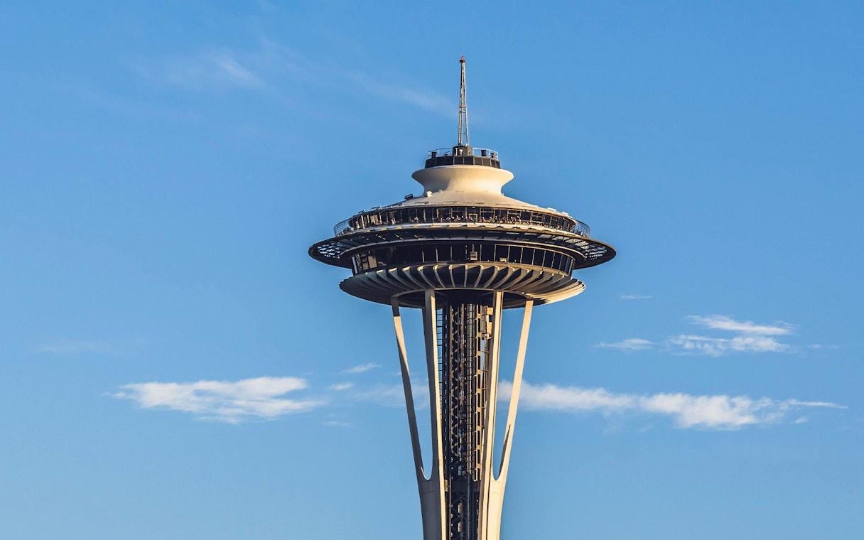 Seattle Space Needle against a clear blue sky.