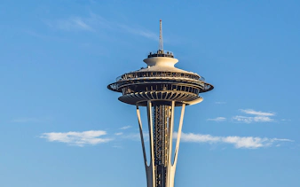 Seattle Space Needle against a clear blue sky.