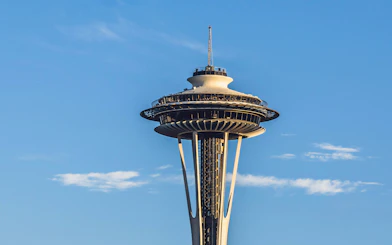 Seattle Space Needle against a clear blue sky.