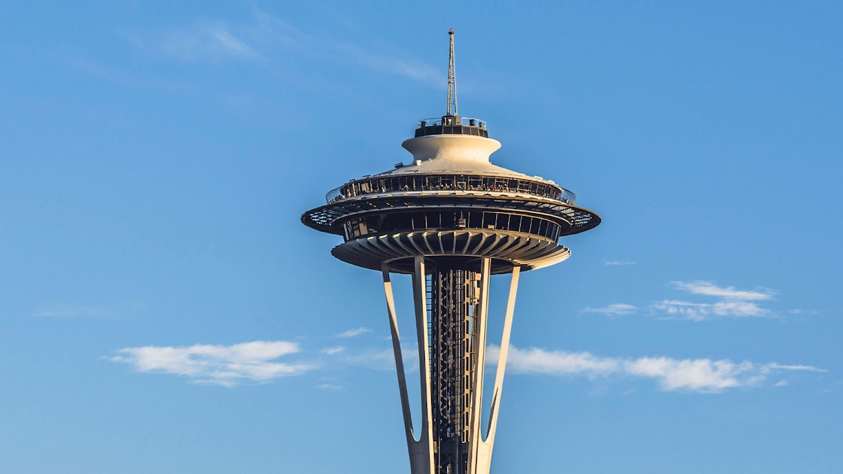 Seattle Space Needle against a clear blue sky.