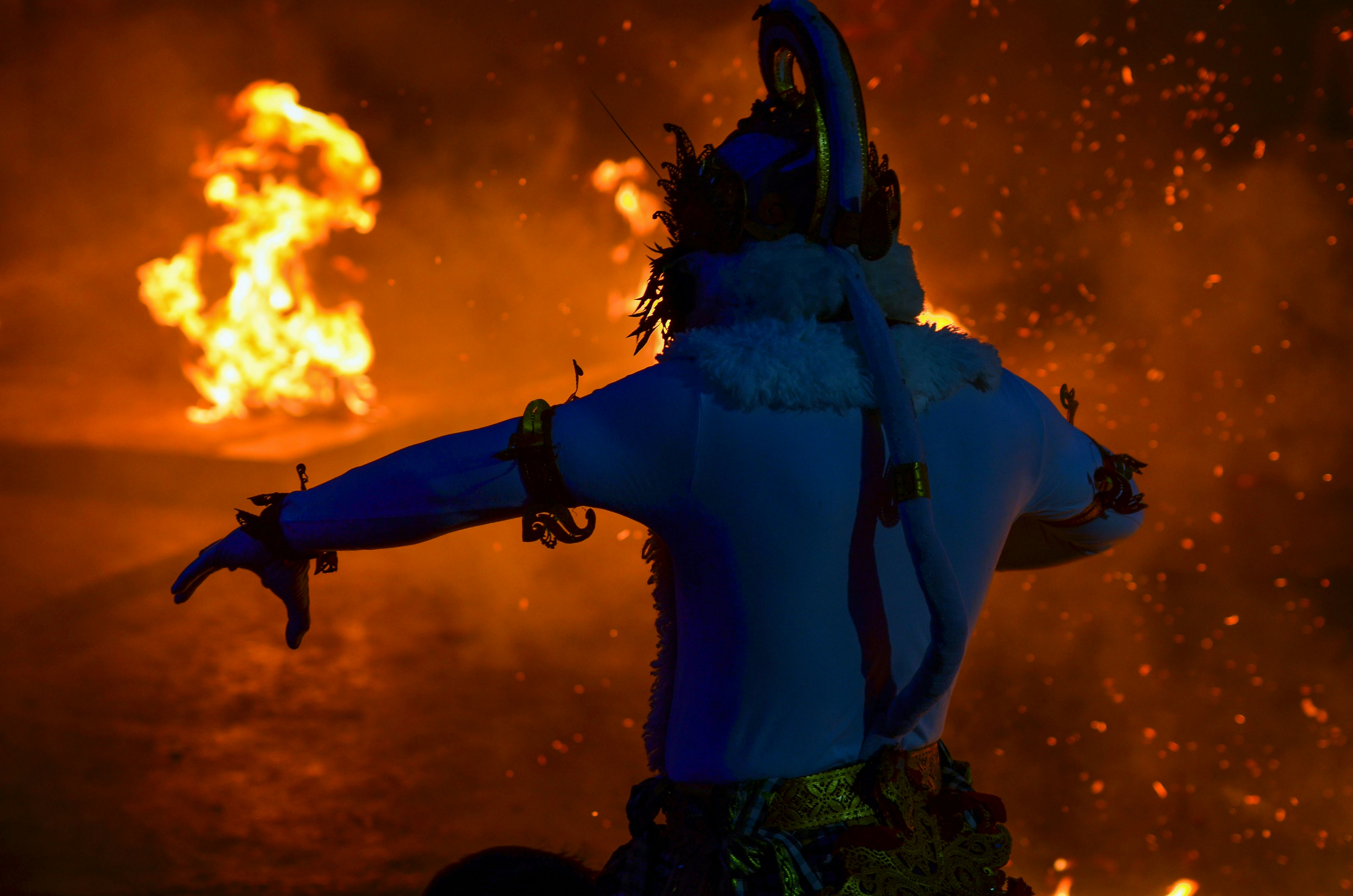 Performer in traditional costume at Uluwatu Kecak & Fire Dance Show, Bali.