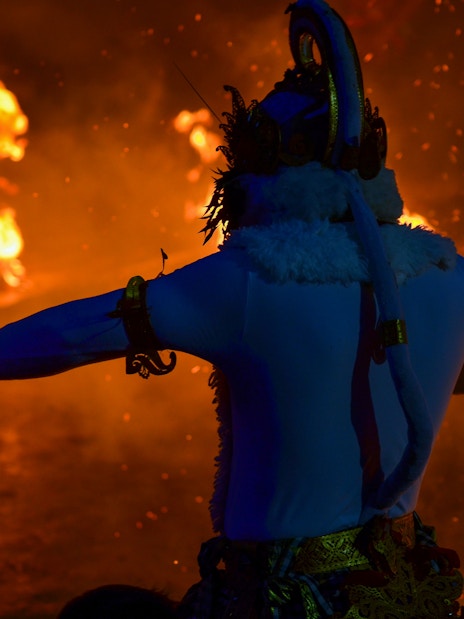 Performer in traditional costume at Uluwatu Kecak & Fire Dance Show, Bali.