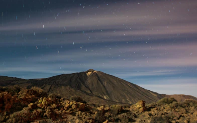 Teide volcano under a starry night sky in Tenerife.