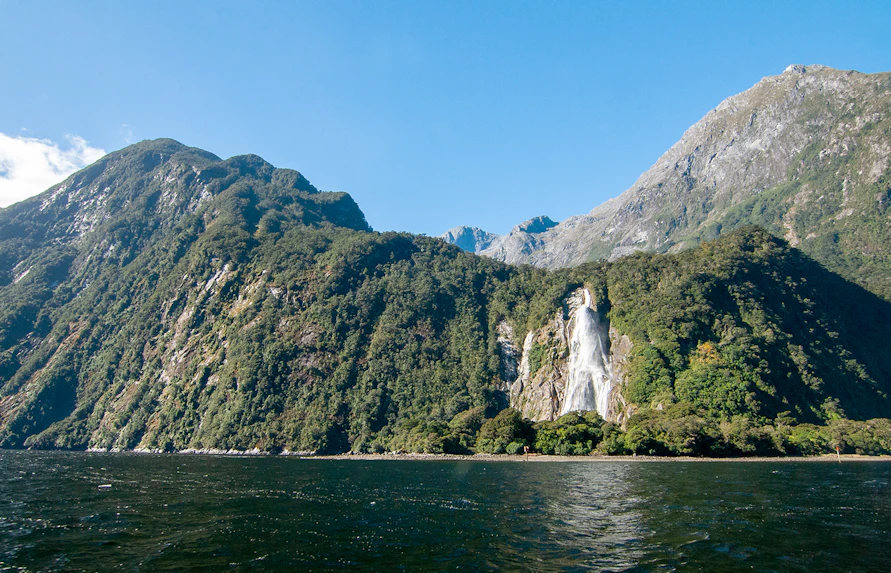 Bowen Falls cascading between Cascade Peak and Barren Peak, Milford Sound.