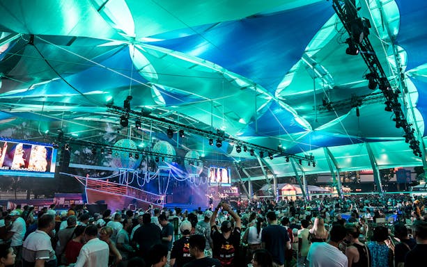 Crowd enjoying performers on the Sail stage at Singapore F1 event.