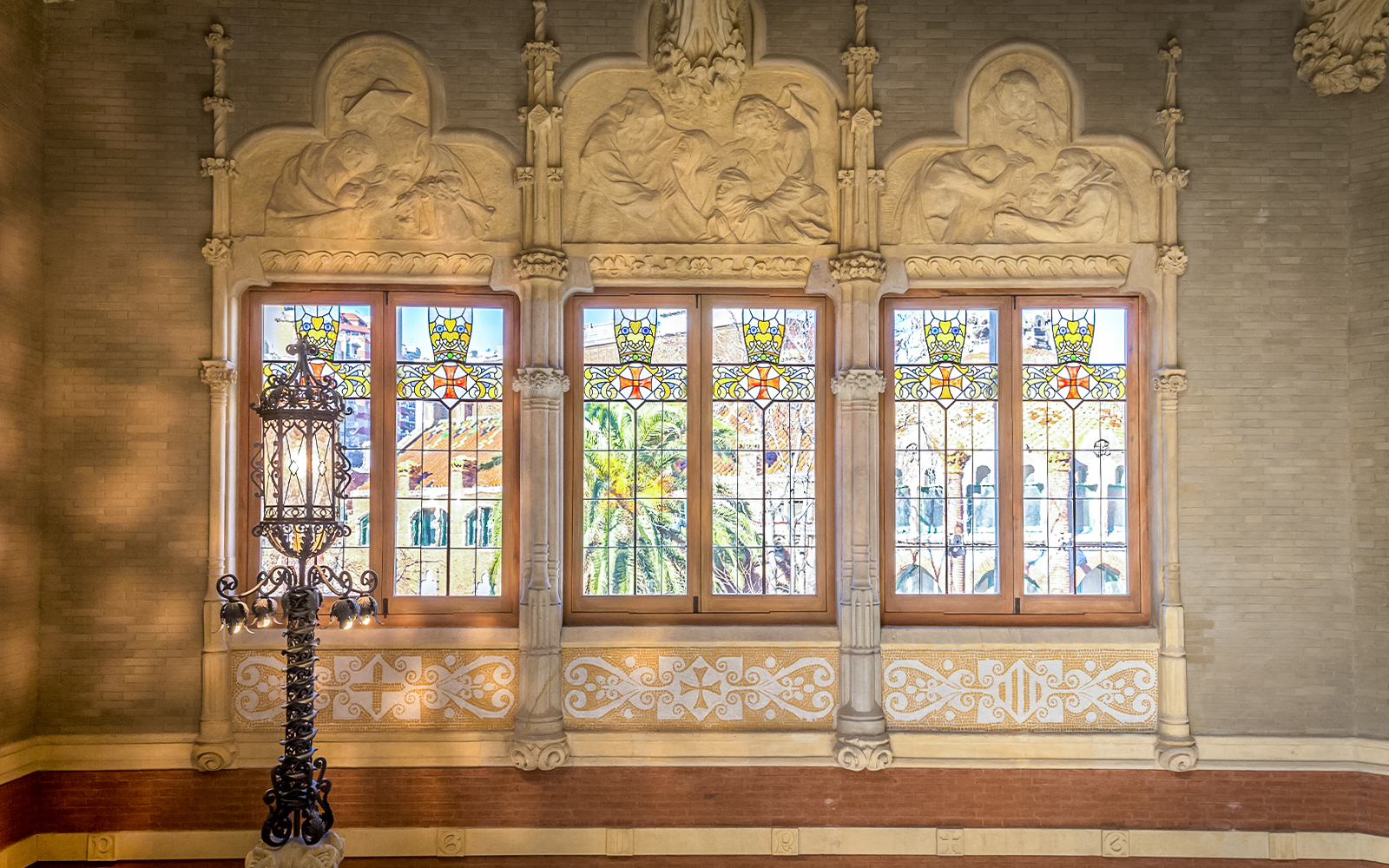 Stained glass windows and ornate carvings at Sant Pau Art Nouveau site, Barcelona.