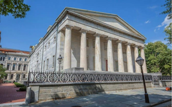 Historic building with columns in Philadelphia's Old Town, part of a self-guided city exploration game.