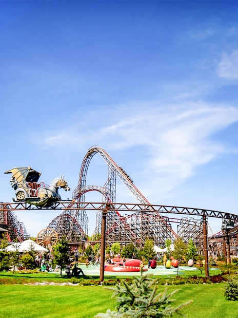 Rollercoaster and Ferris wheel at Energylandia Theme Park, Zator, near Krakow, Poland.