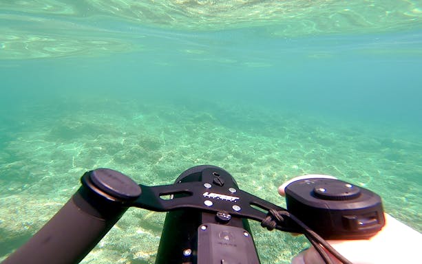Underwater scooter ride in Nice, France, exploring clear ocean waters.