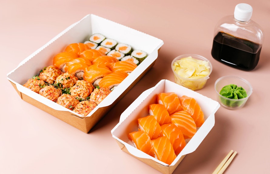 Sushi rolls in a delivery box