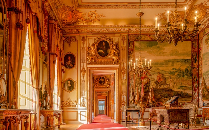 Blenheim Palace State Rooms with ornate chandeliers, portraits, and tapestries.