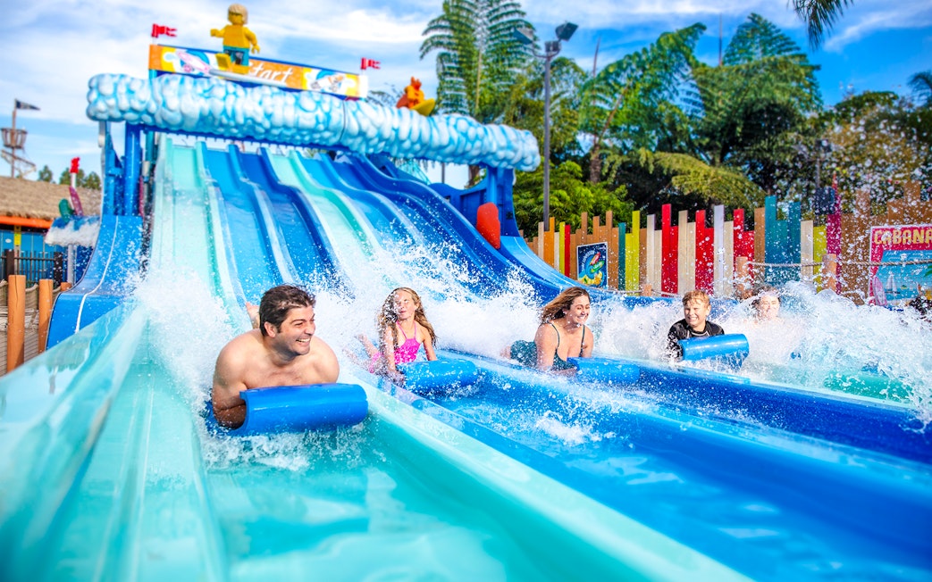 Family enjoying water slides at LEGOLAND® California Water Park.