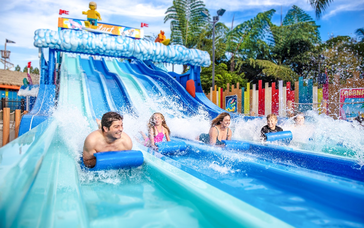 Family enjoying water slides at LEGOLAND® California Water Park.