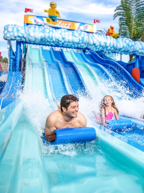 Family enjoying water slides at LEGOLAND® California Water Park.