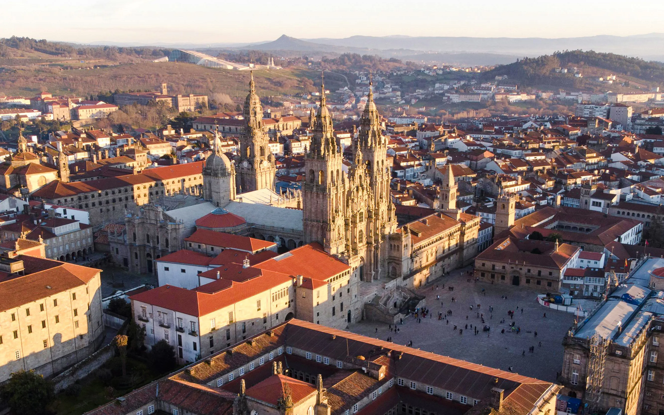 Aerial view of the Cathedral of Santiago de Compostela, Spain, surrounded by historic buildings.