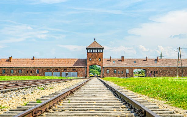 Rail tracks leading to Auschwitz Birkenau entrance, Poland.
