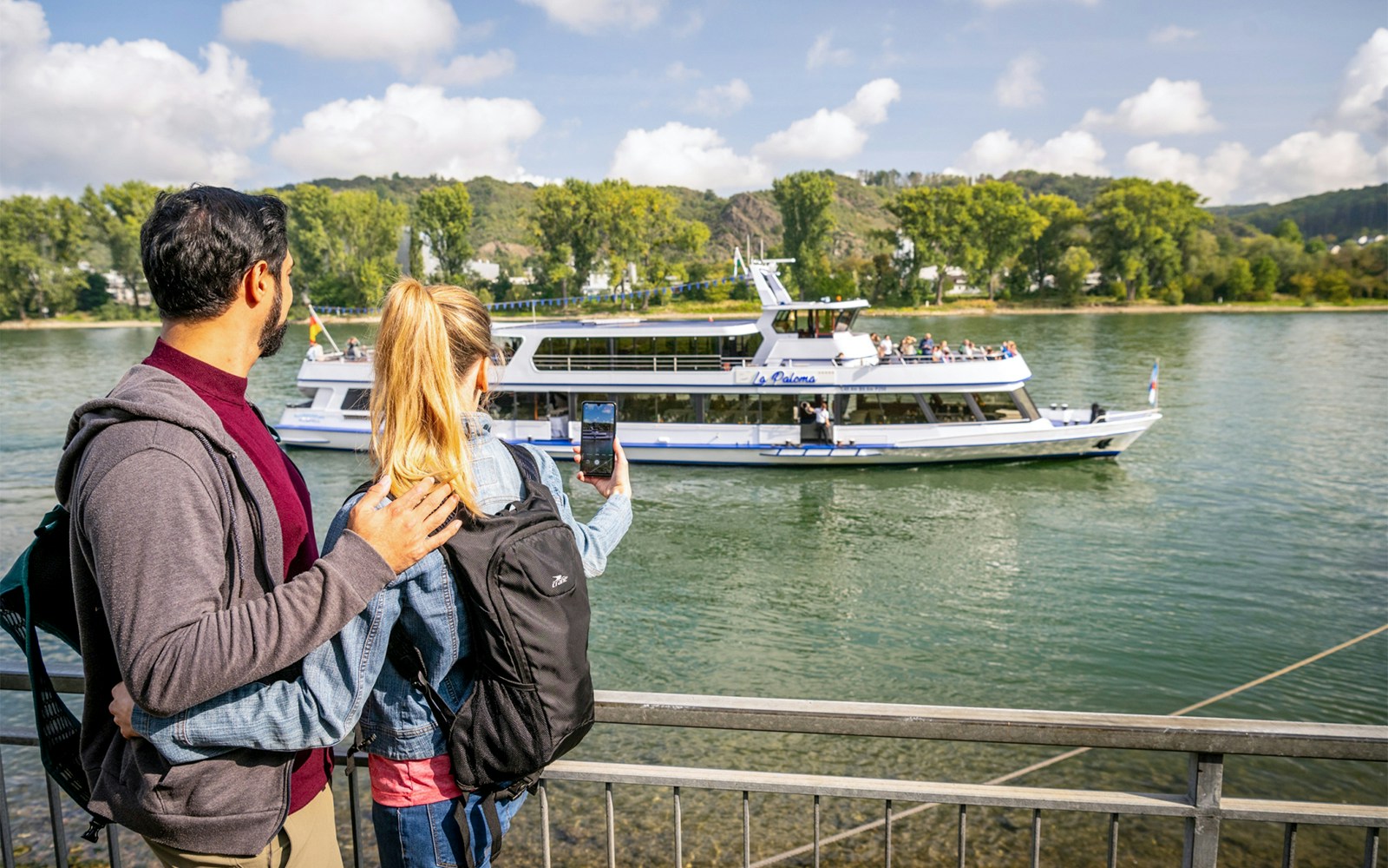 Tourists watching Koblenz Sightseeing Cruise